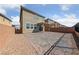 Spacious backyard with a large patio, perfect for outdoor entertaining and relaxation at 2785 Donatello Manor Pl, Henderson, NV 89044