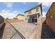 Charming backyard featuring a covered patio and paved area, perfect for outdoor entertaining at 2785 Donatello Manor Pl, Henderson, NV 89044