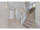 Bright entryway with staircase and tile flooring at 2785 Donatello Manor Pl, Henderson, NV 89044