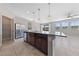 Kitchen with stainless steel appliances, large island, and ample natural light at 2785 Donatello Manor Pl, Henderson, NV 89044