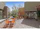 Inviting outdoor seating area with tables and chairs, ideal for enjoying coffee or meals in a relaxed setting at 2785 Donatello Manor Pl, Henderson, NV 89044