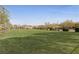 Expansive park with lush lawn, picnic areas, and walking paths, perfect for community gatherings and outdoor enjoyment at 2785 Donatello Manor Pl, Henderson, NV 89044