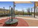 Community playground featuring shaded swings and climbing structures for active fun at 2785 Donatello Manor Pl, Henderson, NV 89044