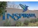 The Inspirada community sign stands tall, a beacon of the neighborhood's commitment to vibrant living at 2785 Donatello Manor Pl, Henderson, NV 89044