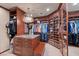 A well-organized walk-in closet boasts custom shelving and a stylish island with granite top at 3102 La Mirada Ave, Las Vegas, NV 89120