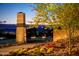 Cadence community entrance featuring attractive brick monument and colorful landscaping with city views in the background at 340 N Taylor St, Henderson, NV 89015