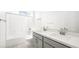 This bright bathroom features double sinks, a shower-tub combo, and modern fixtures at 340 Taylor St, Henderson, NV 89015