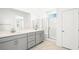 This bathroom features double sinks, ample counter space, and a glass shower enclosure at 340 Taylor St, Henderson, NV 89015