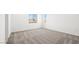 This bright bedroom boasts a neutral color palette, carpet flooring, and multiple windows offering views at 340 Taylor St, Henderson, NV 89015