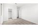 The bedroom features neutral carpet, a window, and a closet with white doors at 340 Taylor St, Henderson, NV 89015