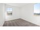 This bedroom has neutral carpeting and two windows providing great natural light at 340 Taylor St, Henderson, NV 89015