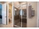 Shower room with tiled walls and a seat at 3468 Isle Dr, Las Vegas, NV 89141