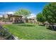 Lush green community park with walking trails, picnic areas and mature trees, perfect for outdoor activities at 3468 Isle Dr, Las Vegas, NV 89141