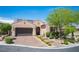 Charming single-story home featuring a paved driveway, manicured landscaping, and a welcoming entrance at 3468 Isle Dr, Las Vegas, NV 89141