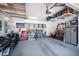 Spacious garage features overhead storage and room for two vehicles at 3468 Isle Dr, Las Vegas, NV 89141