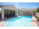 Inviting backyard pool and patio area perfect for relaxing and entertaining at 3468 Isle Dr, Las Vegas, NV 89141