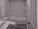 Spotless bathroom featuring modern fixtures, and a bathtub with a shower for added convenience at 4184 Lady Lucille Ct, Las Vegas, NV 89115