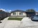 Charming single-story home with a well-manicured front yard and a covered parking area at 4184 Lady Lucille Ct, Las Vegas, NV 89115