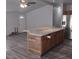 Modern kitchen featuring a granite island countertop, stainless steel appliances, and wood flooring at 4184 Lady Lucille Ct, Las Vegas, NV 89115