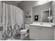 Clean and updated bathroom featuring a shower-tub combo and a modern vanity at 4204 Sprints Race Ave, North Las Vegas, NV 89084
