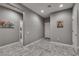 Open-concept entryway with stylish gray walls, recessed lighting, and durable, easy-to-clean flooring at 4204 Sprints Race Ave, North Las Vegas, NV 89084