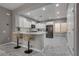 Beautiful kitchen with stainless steel appliances, marble countertops, and barstool seating at 4204 Sprints Race Ave, North Las Vegas, NV 89084