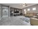 Well-lit living room with entertainment center and comfortable seating area at 4204 Sprints Race Ave, North Las Vegas, NV 89084