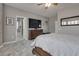 Comfortable main bedroom with attached bathroom and TV at 4204 Sprints Race Ave, North Las Vegas, NV 89084