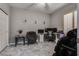 Functional home office with natural light, neutral gray walls, and well-maintained flooring at 4204 Sprints Race Ave, North Las Vegas, NV 89084