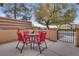 Private outdoor patio with table and chairs, ideal for enjoying meals or gatherings at 4204 Sprints Race Ave, North Las Vegas, NV 89084