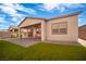 Manicured backyard with a patio and an outdoor seating area at 44 Alta Cascata Pl, Henderson, NV 89011