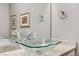Modern bathroom featuring a glass vessel sink and granite countertop at 480 Heritage Bridge Ave, Henderson, NV 89011