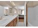Bathroom featuring dual sinks and access to the bedroom and a bathtub at 5000 Red Rock St # 259, Las Vegas, NV 89118