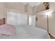 Spacious bedroom with plush carpeting and ample closet space for storage at 5000 Red Rock St # 259, Las Vegas, NV 89118