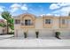 Inviting multi-Gathering home featuring garages, a balcony, and desert landscaping at 5000 Red Rock St # 259, Las Vegas, NV 89118