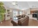 Spacious living room featuring hardwood floors, a ceiling fan, and comfortable seating at 5000 Red Rock St # 259, Las Vegas, NV 89118