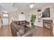 Inviting living room with a fireplace, hardwood floors, and stylish furniture at 5000 Red Rock St # 259, Las Vegas, NV 89118