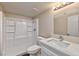 Clean bathroom with a modern sink vanity, large mirror, and shower-tub combination, perfect for daily routines at 5021 River Glen Dr # 45, Las Vegas, NV 89103