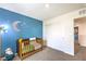 This cozy Bedroom has a painted accent wall, wooden crib, and closet, creating a peaceful space at 516 Red Lovebird Ave # Lot 1242, Henderson, NV 89011