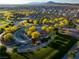 A clean aerial view of the community park, including playground, picnic areas, mature landscaping and walking paths at 516 Red Lovebird Ave # Lot 1242, Henderson, NV 89011