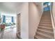Inviting entryway showcasing the staircase, leading into the living area with bright, natural light at 516 Red Lovebird Ave # Lot 1242, Henderson, NV 89011