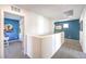 Bright upstairs hallway connecting bedrooms, featuring neutral paint, and modern design elements at 516 Red Lovebird Ave # Lot 1242, Henderson, NV 89011