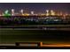Night view of the city skyline with fireworks over the lake and well manicured park at 516 Red Lovebird Ave # Lot 1242, Henderson, NV 89011