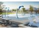 Community splash pad featuring picnic tables and lounge chairs for relaxation and Gathering fun at 516 Red Lovebird Ave # Lot 1242, Henderson, NV 89011