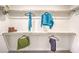 Organized walk-in closet featuring ample shelving, hanging rods, and neutral carpeting for storage at 516 Red Lovebird Ave # Lot 1242, Henderson, NV 89011