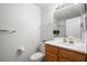 Clean bathroom with a wood vanity and walk-in shower at 5201 S Torrey Pines Dr # 1221, Las Vegas, NV 89118