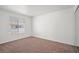 Bedroom featuring neutral carpeting and a bright window at 5201 S Torrey Pines Dr # 1221, Las Vegas, NV 89118