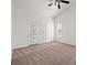 Bright bedroom with a ceiling fan and access to the exterior at 5201 S Torrey Pines Dr # 1221, Las Vegas, NV 89118