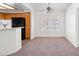 Bright dining area with a large window and neutral carpeting at 5201 S Torrey Pines Dr # 1221, Las Vegas, NV 89118