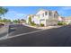 Gated townhome community features well-manicured landscaping and classic architectural details at 5201 S Torrey Pines Dr # 1221, Las Vegas, NV 89118